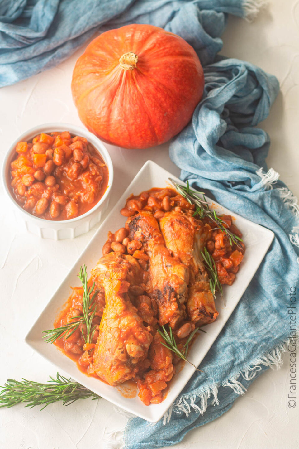 Chicken with pumpkin and green beans in a pan