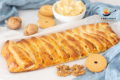 Puff pastry strudel with biscuit cream and nuts