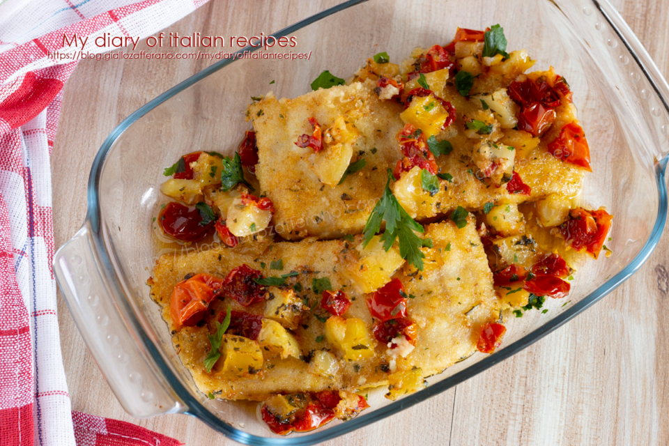 Baked perch with potatoes and cherry tomatoes