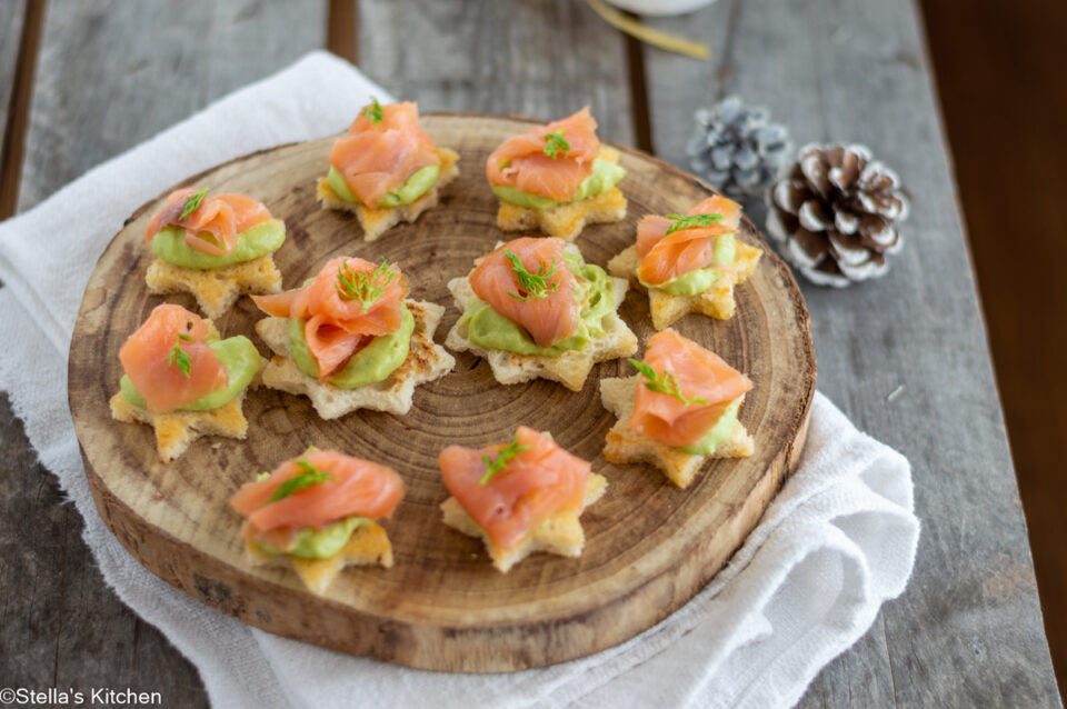 Canapes with salmon and avocado mousse