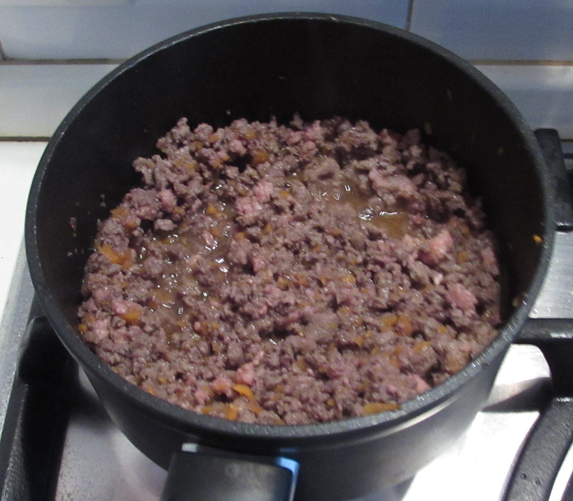 cooking the ground beef for original bolognese sauce