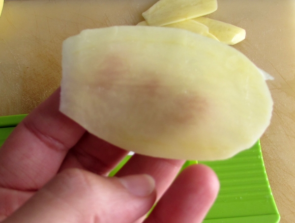 very thine slices of potatoes made with vegetables slicer