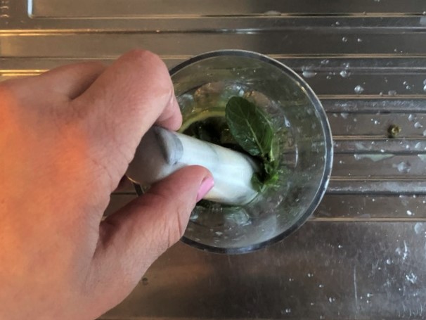 muddle mint and lime for the non-alcoholic virgin mojito