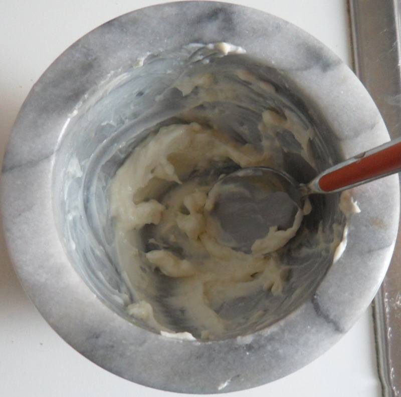 mix greek yogurt and chopped garlic for tzatziki dip