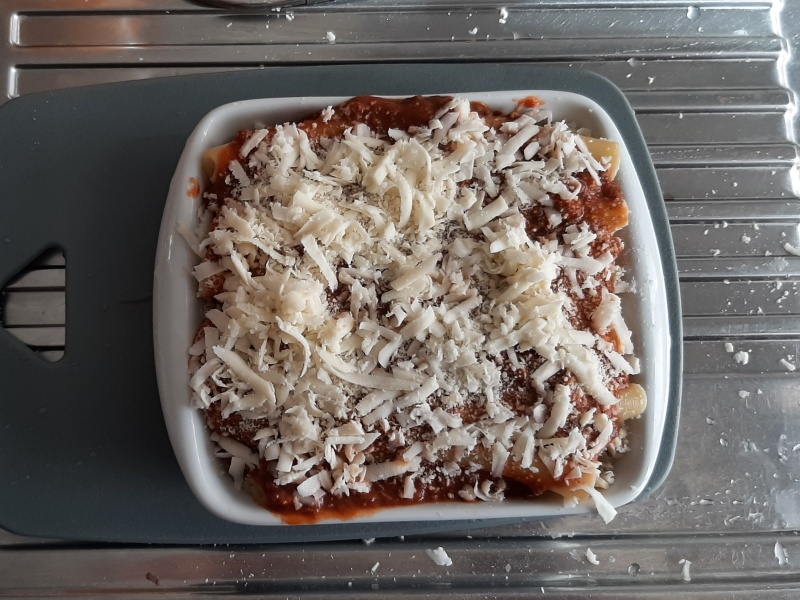 the baked ziti bolognese is ready to go in the oven