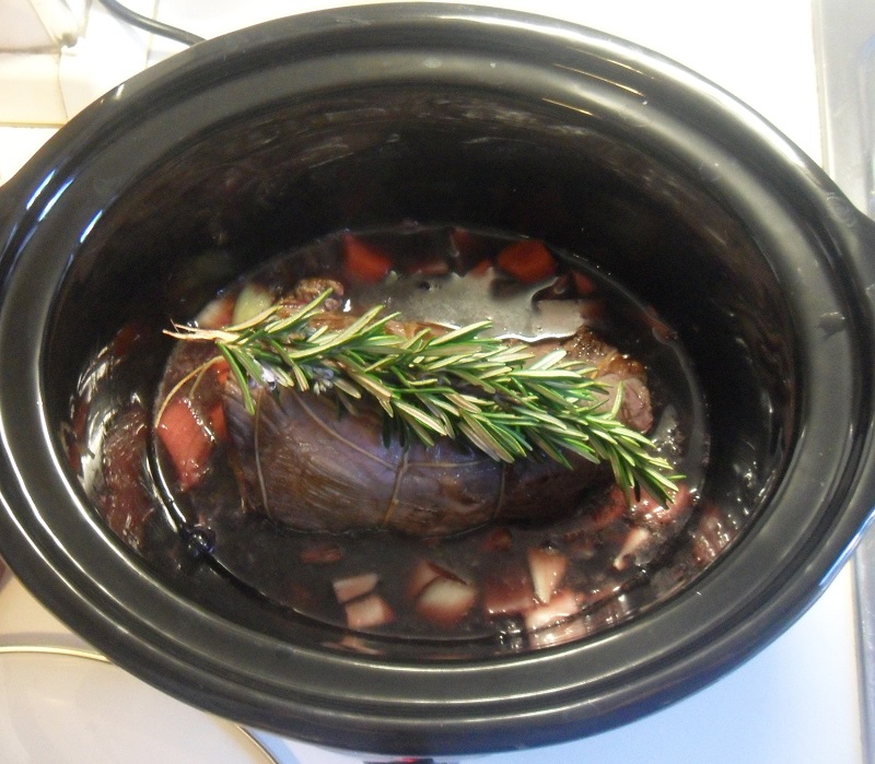 put the beef and th red wine in the crock-pot