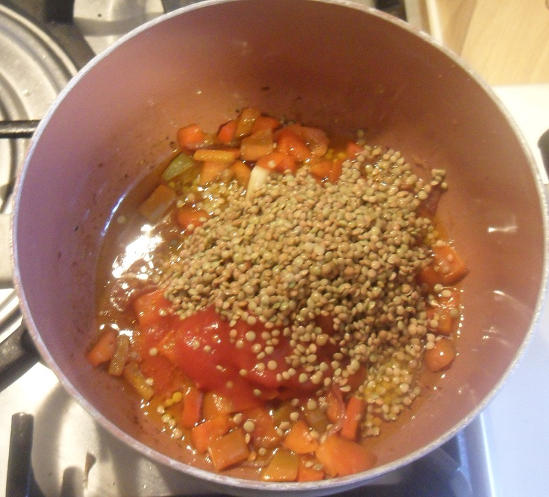 add dried lentil to the pot to make the vegetarian lentil chili