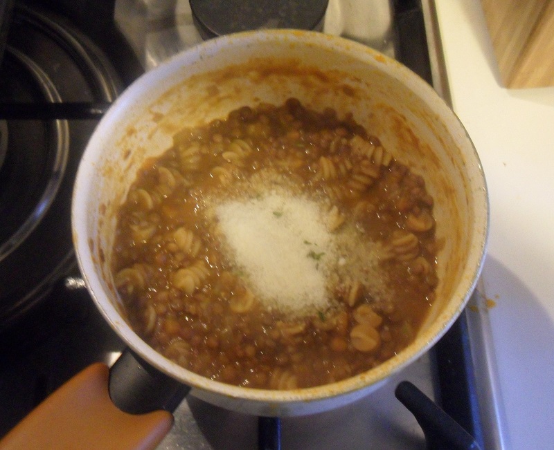 add grated parmesan cheese to the pasta and lentil soup