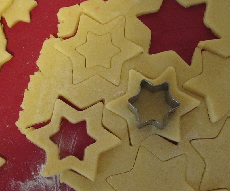 cut gluten-free cookies with two cookie cutters of two different sizes