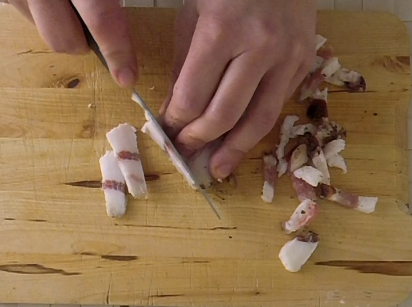 cut the slices of guanciale in to stripes for carbonara recipe