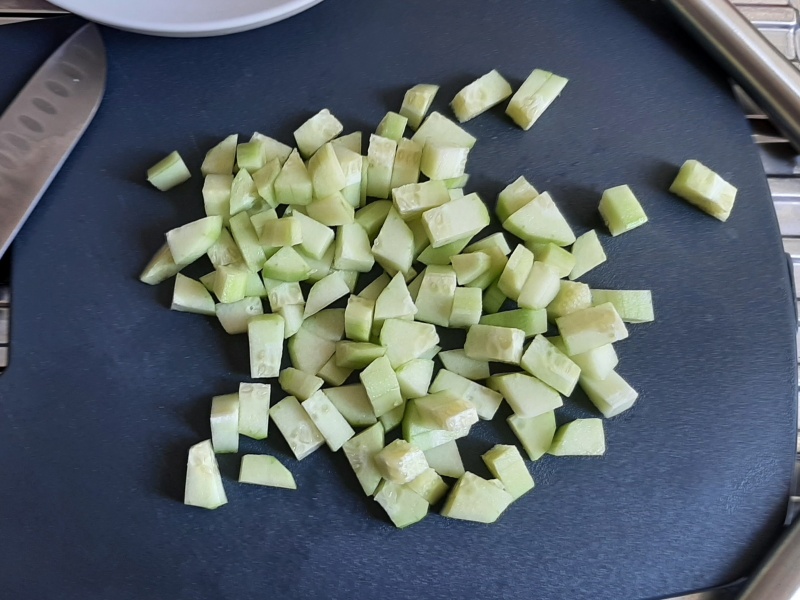 cut the cucumber for the chicken salad