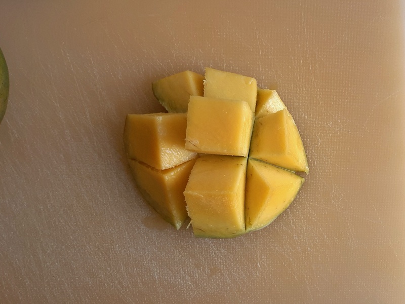 remove the mango pulp from the peel