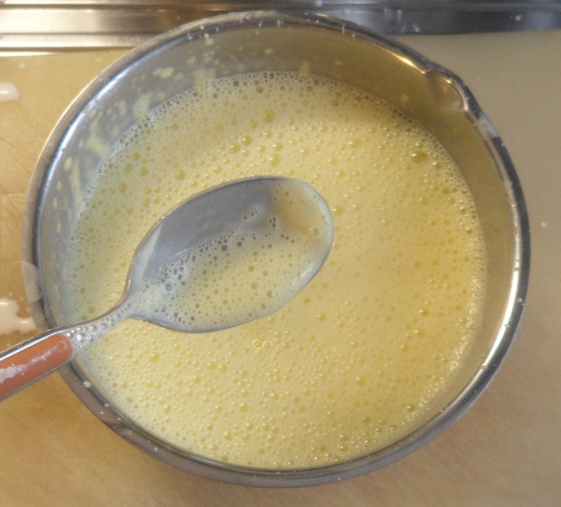 pour the cold milk into the egg yolks and sugar mixture