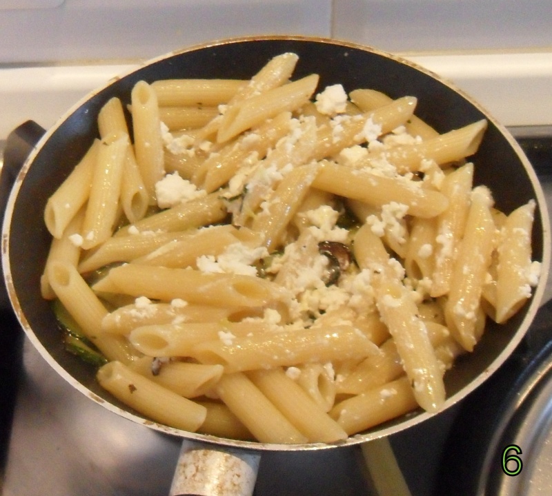 add feta cheese to the zucchini squash pasta