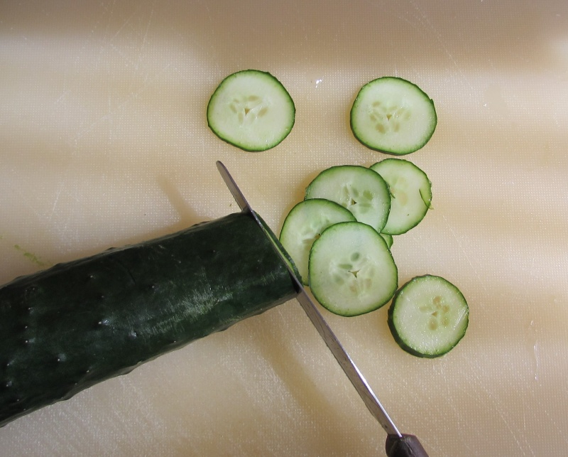 cut the cucumber in to thin slices