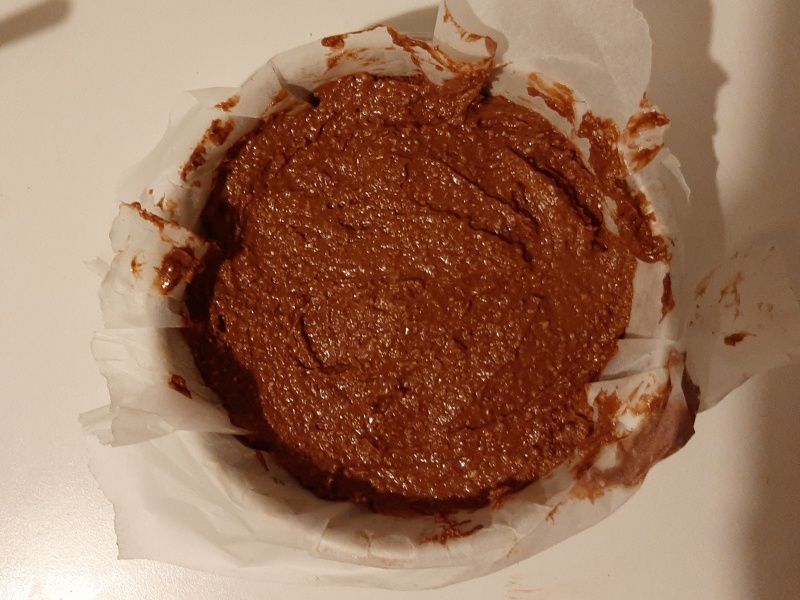 Pour the chocolate caprese cake batter into an 8-inch cake pan