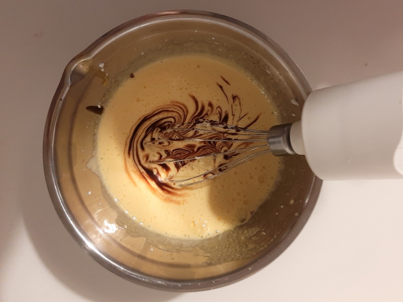 add the melted dark chocolate to the caprese cake dough