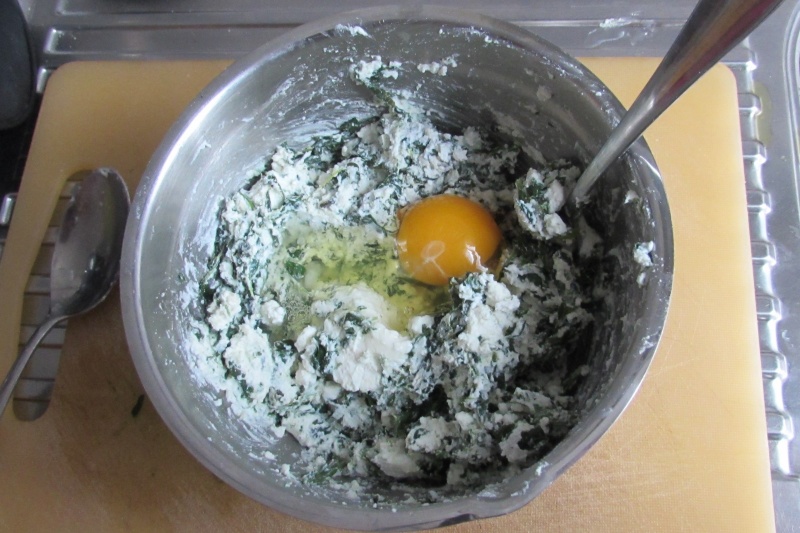 add the egg to the ricotta and spinach mixture