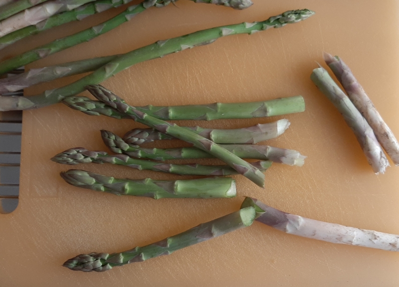 clean the asparagus by removing the final part of the stem